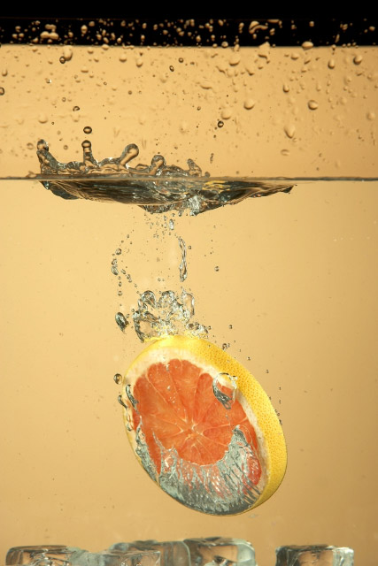 Food action label photography orange water splash
