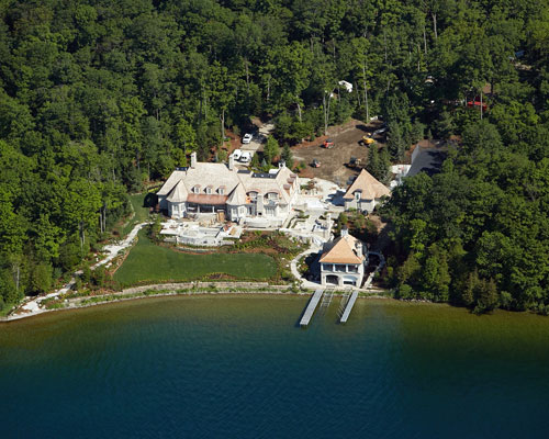 Aerial Photography of mansion on lakeshore property