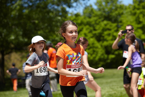 Event Photography of child running at Tim Hortons Run/Walk