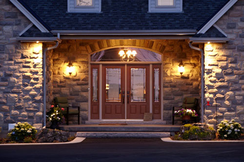 Residential Photography exterior stone wall with red front door Pollard Windows