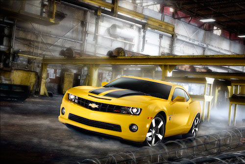 Sport car photography 2013 yellow and black bumblebee transformers Chevrolet Camaro SS in industrial factory