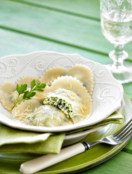 Pasta photography ricotta, spinach and lemon ravioli with brown butter sauce