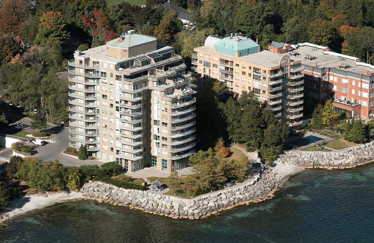 Real estate aerial photography of apartment building complex in Burlington on lakeshore of Lake Ontario