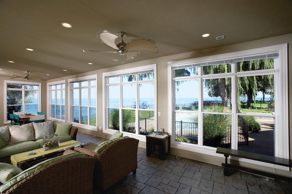 Interior Architectural Photography of screened in porch looking over the lake