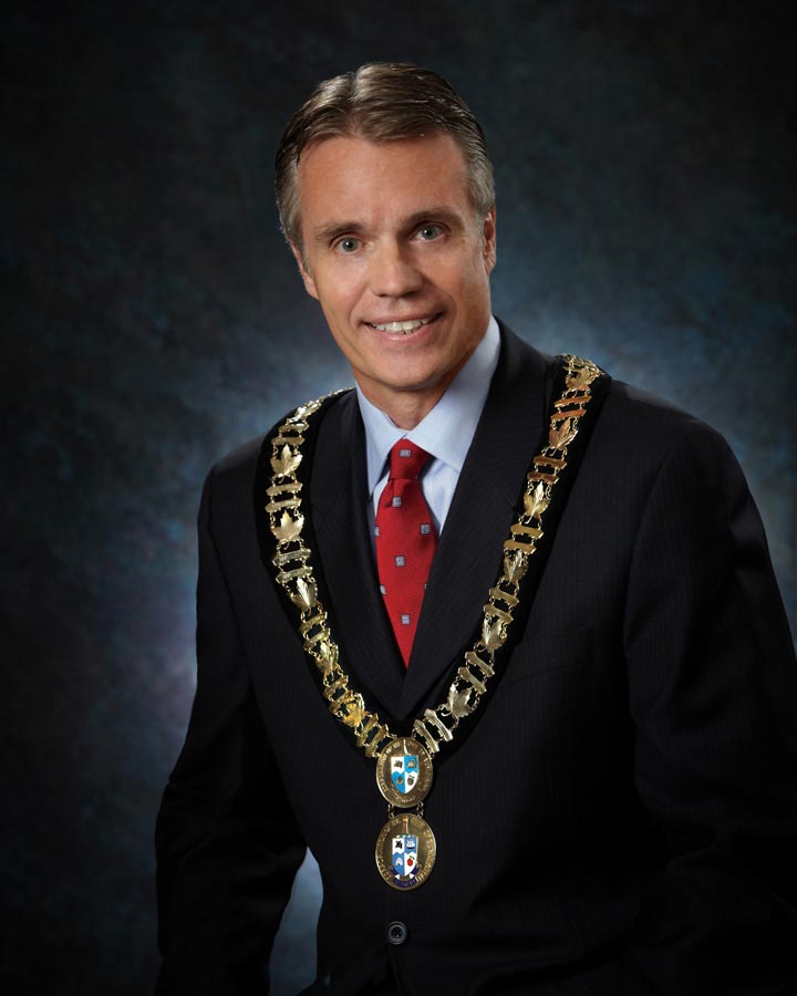 Burlington Business Portrait Photography of Mayor of Burlington Ontario Rick Goldring on dark background