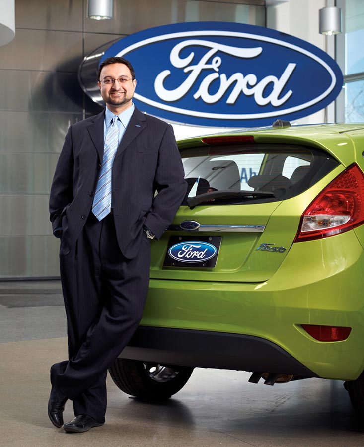 Oakville Portrait Photographer of executive for Ford Motor Company with fiesta