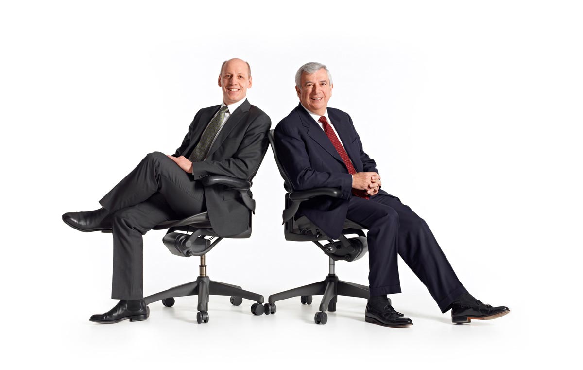 Group Portrait Photographer executive members on office chairs