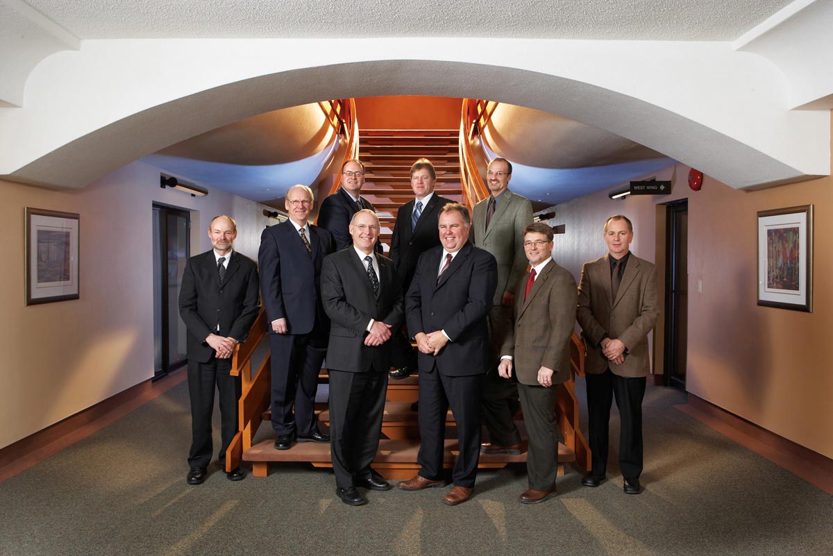 Team Portrait Photography of executive on staircase at workplace