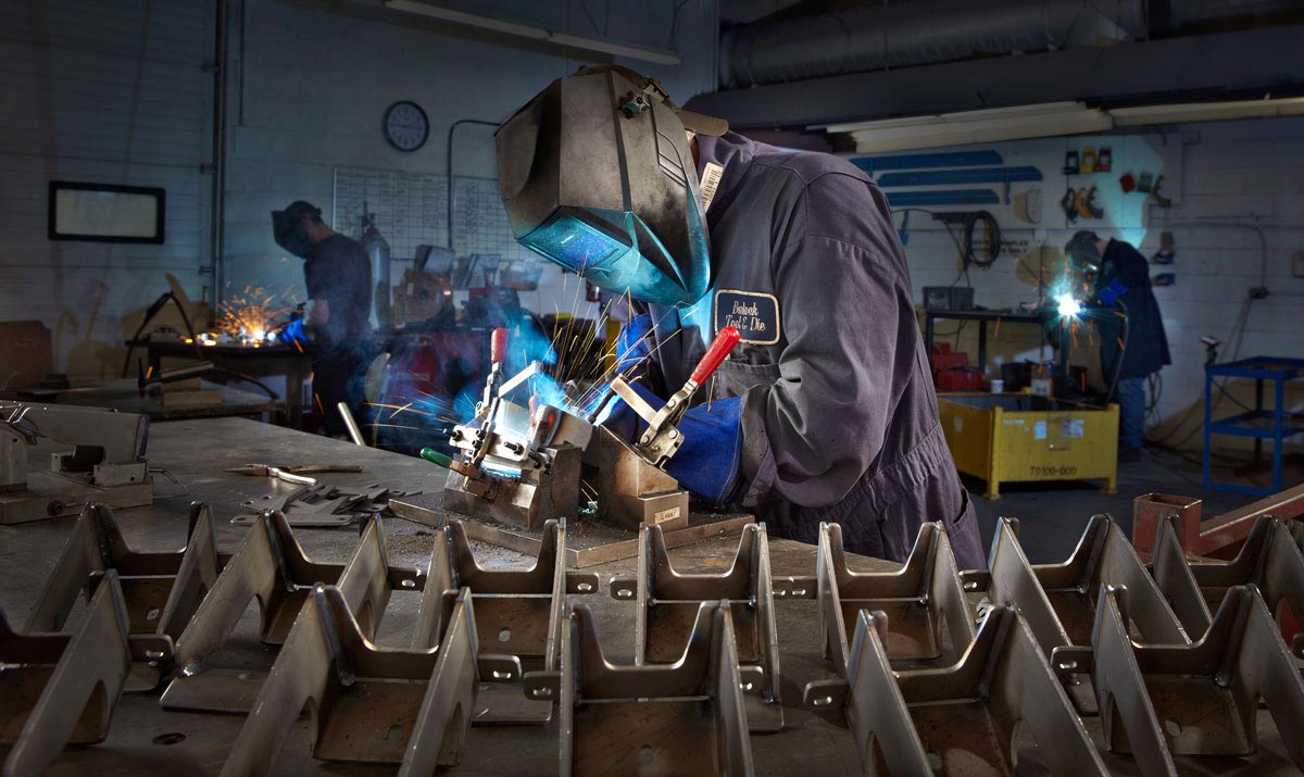 Industrial Welder Photography of metal mig welding Burloak Tool & Die