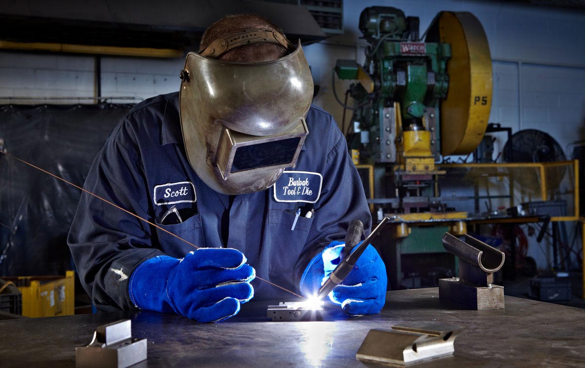 Industrial Welding Photography of metal tig welder Burloak Tool and Die