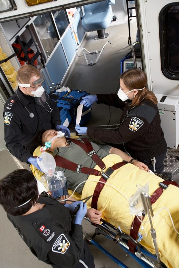 Lifestyle Paramedic Photography of Peel Region EMS assisting man in accident