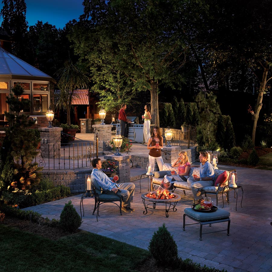 Lifestyle Social Gathering Photography of backyard patio conversation around fireplace