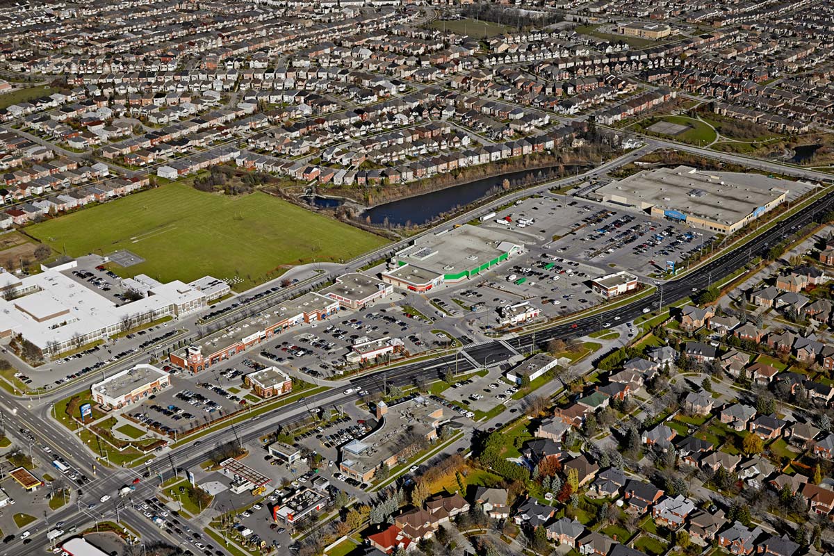 Aerial Photography of shopping centre outlet mall including retail, grocery stores and Walmart