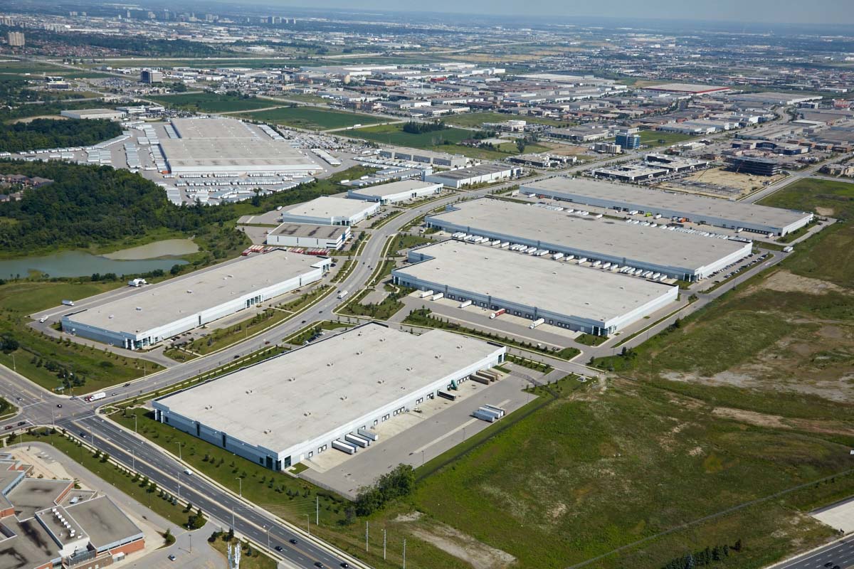 Commercial aerial photography of distribution centre warehouse with transport trucks