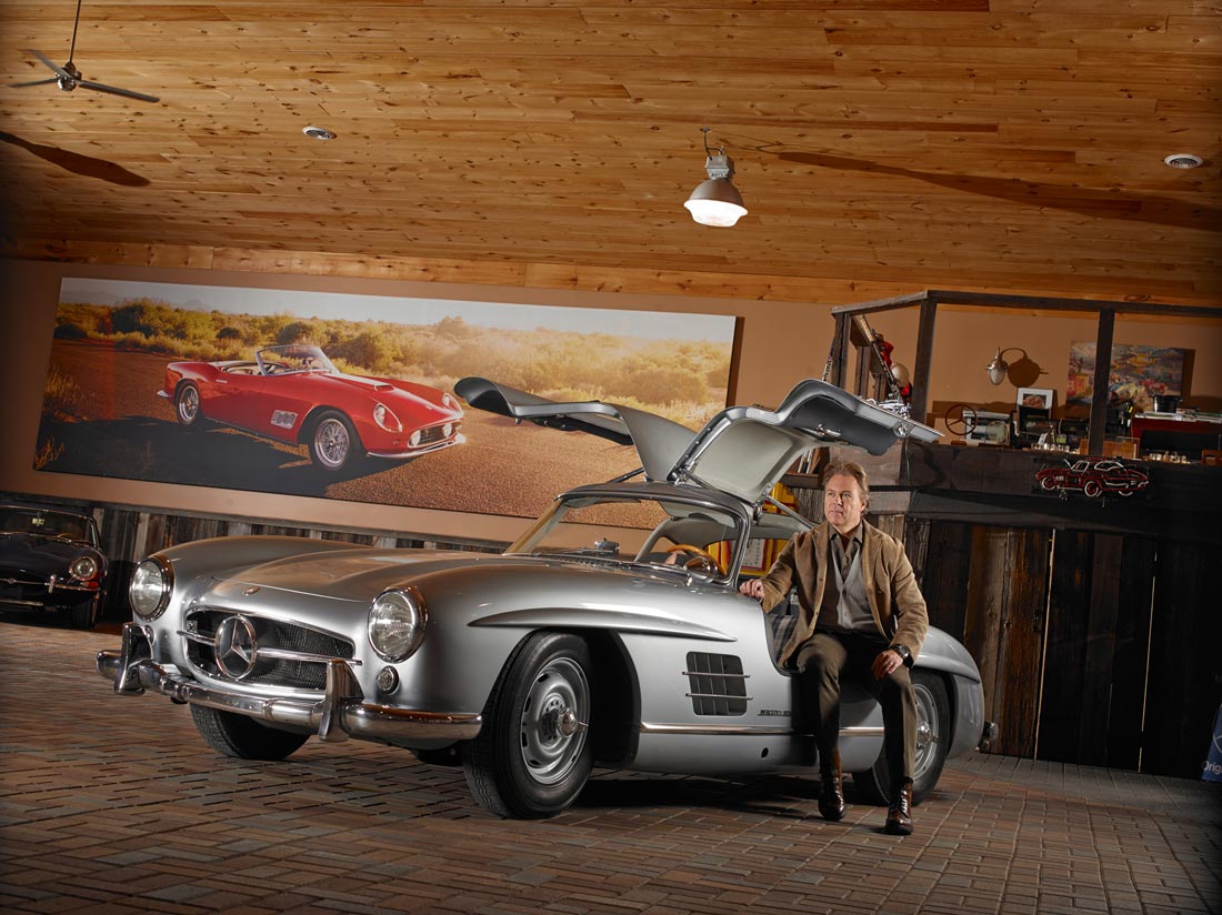 Portrait photography of man with expensive vintage car
