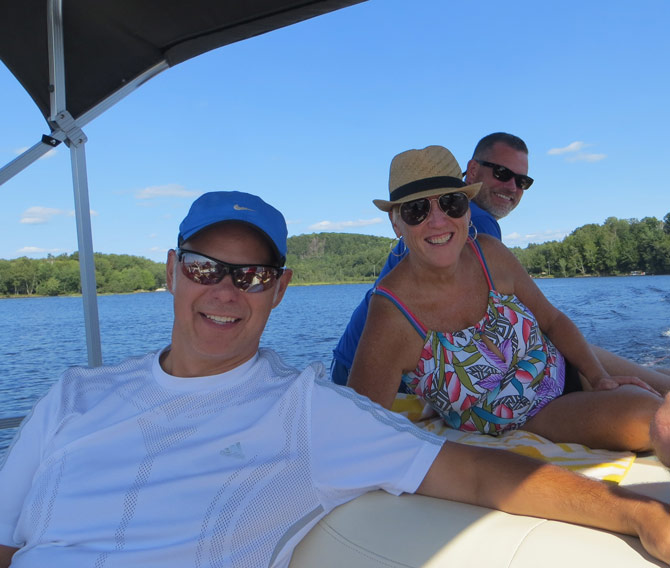 Bochsler Photo Imaging crew boating John, Michele and Craig in Huntsville