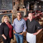 Portrait photography of restaurant owners group