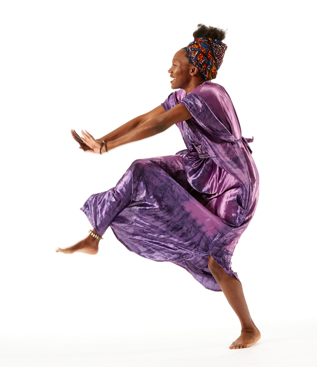 Illustrative Photo - African American Women Dancing In Purple Dress