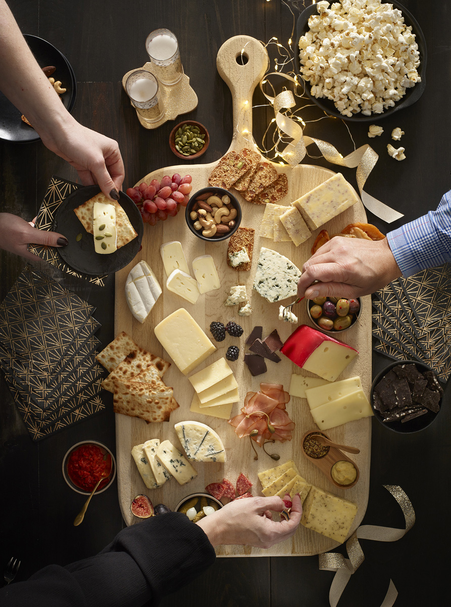 Food Photo - People Sampling Cheese Board